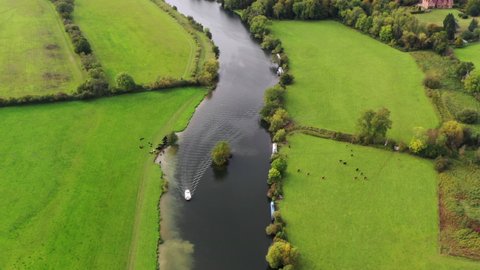 4k aerial footage over The River Thames in the countryside of Berkshire, UK