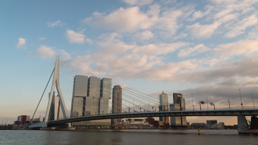Rotterdam Netherlands Cityscape Skyline and Erasmusbrug Erasmus Bridge Crosses The Nieuwe Maas River Time Lapse Royalty-Free Stock Footage #1060034570