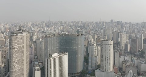 Aerial view of downtown São Paulo, Brazil, backward movement, historic buildings in downtown SP