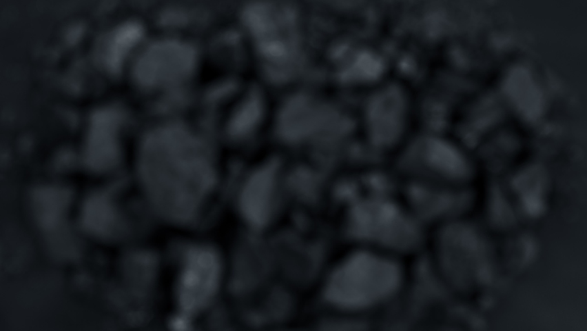 Super Slow Motion Shot of Coal Explosion Isolated On Black Background at 1000 fps. Royalty-Free Stock Footage #1060088198