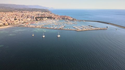 Footage from the drone of the gulf of Alghero towards the port and the old city