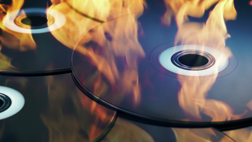 Blu Ray Discs In Flames - Burning Data Concept (actual video is sharp, no pixelation)