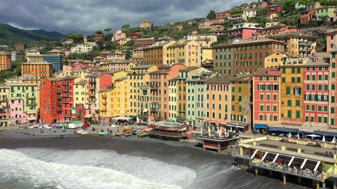 the rough sea breaks on the coast of Camogli, Genoa, Liguria, Italy. Vista aerea realizzata con drone