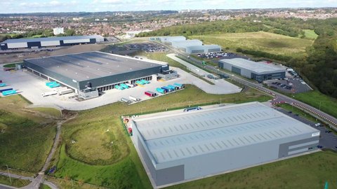 Leeds UK, 29th Sep 2020: Aerial drone footage of the the Amazon distribution centre in the town of Leeds, West Yorkshire in the UK showing the centre and roads around the main building