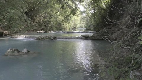 waterfalls produced by the river elsa in the fluvial park of colle di val d'elsa tuscany unedited video color f-log