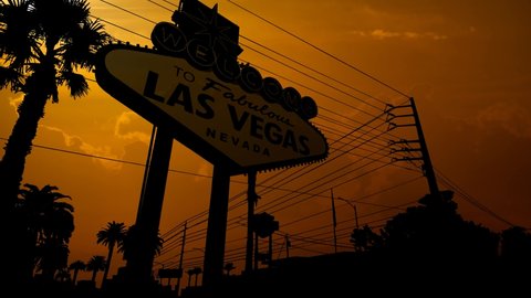 The Welcome to Las Vegas Sign at Sunset, Time Lapse with Red Sun and Fiery Sky, Nevada USA
