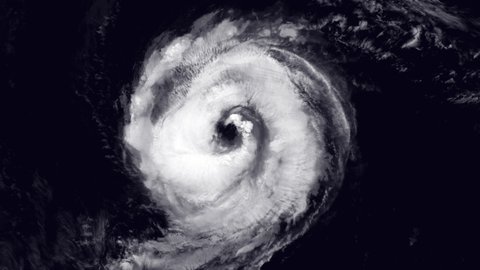 Rotating Hurricane eye satellite aerial view, scary powerful storm animation. Images furnished by Nasa