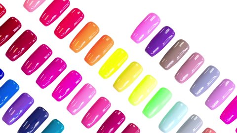 Multicolored nail Polish samples on white background isolated. Beauty banner. Trendy pattern. Nail varnish. Fashion, style. Summer manicure. Cosmetic products. Stop motion animation. Flat lay.