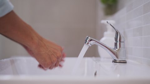 People are washing hands with foam soap and clean water. Wash your hands to keep them clean and prevent the spread of viral