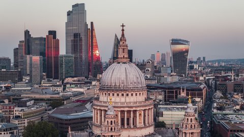 Establishing Aerial View Shot of London UK, St Paul's Cathedral & The City of London, amazing colors during sunset, United Kingdom