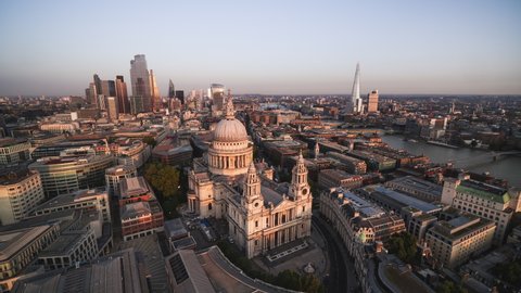 Aerial View Shot of London UK, Epic sunset, St Paul's Cathedral & City of London, Tower Bridge, United Kingdom
