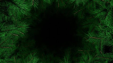 Christmas tree background. Christmas branches. New Year fir tree with decorations and illumination. Xmas tree decorations background. New Year and Christmas 2021, 2022. Loop animation 4K