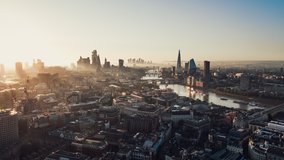 Establishing Aerial View Shot of London UK, London Skyline, Trafalgar Square, The City  Thames River, United Kingdom, early morning