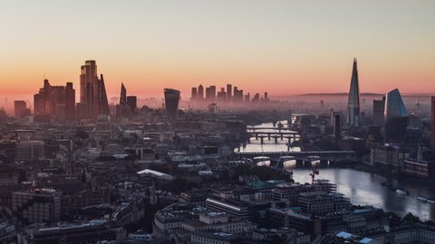 Establishing Aerial View Shot of London UK, London Skyline, St Paul's Cathedral, The City, Thames River, United Kingdom, magical light