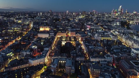 Aerial View Shot of London UK, Covent Garden & St Paul’s Church, United Kingdom, night evening