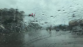 Video clip of rain falling on the windshield