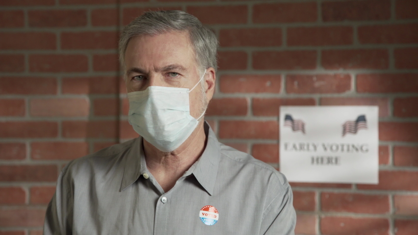 man with a mask during covid-19 who just voted no dolly