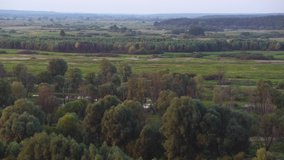 Aerial view of beautiful peaceful countryside green landscape. Countyside of Ukraine. Horiozn view of scenic landscape of Ukraina
