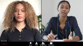 Young Female Doctor Gives Bad News to Patient During Video Call