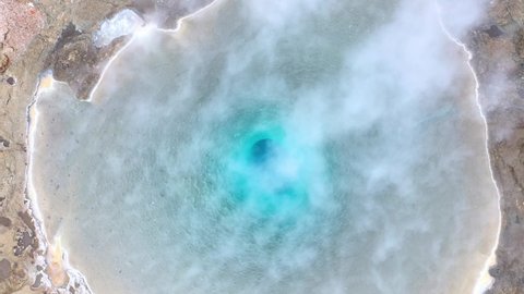 Great Geyser, geysir in the Golden Circle, Iceland, 4k aerial drone view