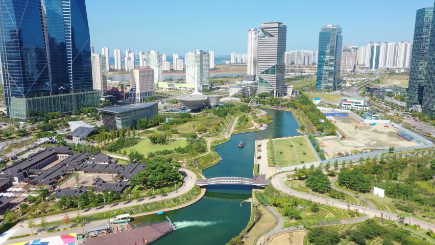 Aerial view of Songdo Central Park, Incheon City, South Korea | Shutterstock HD Video #1060183676