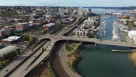 Aerial / drone footage of commercial center, downtown Tacoma, waterfront by Puget Sound, a large city near Seattle in Western Washington, Pacific Northwest, the economic center of Pierce County