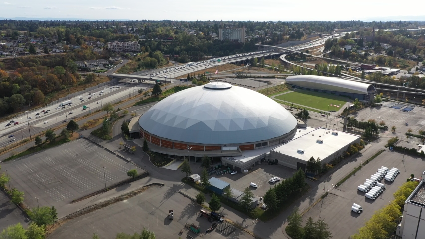Aerial / drone footage of the Tacoma dome, highway 5 by Puget Sound, a large city near Seattle in Western Washington, Pacific Northwest, an administrative and economic center of Pierce County
