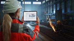 Professional Heavy Industry Engineer Uses Tablet Computer for Augmented Reality Render with Interactive Turbine Engine Blueprint. Female Industrial Specialist Working in a Metal Manufacture Warehouse. - Powered by Shutterstock - Get 15% off with code: PIKWIZARD15