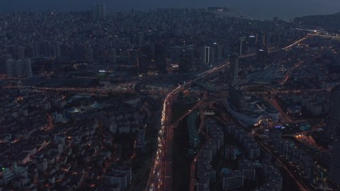 Istanbul Interstate Freeway Intersection at Night from Aerial Perspective with Car Traffic at Dusk