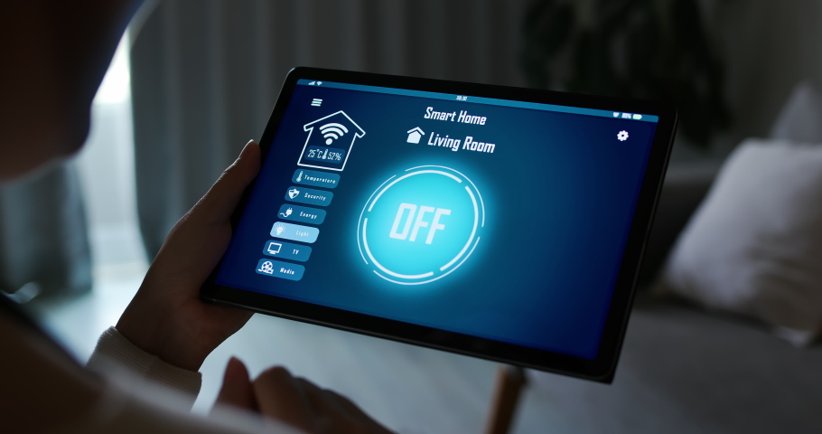asian woman use smart home app to turn on the light with tablet pc Royalty-Free Stock Footage #1060253330