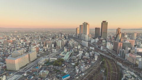Nagoya Japan time lapse 4K, city skyline night to day timelapse at  business center
