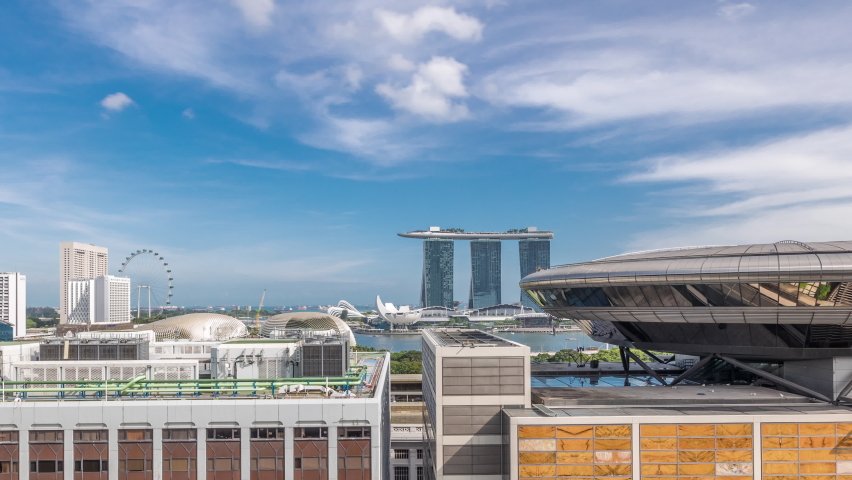 Aerial view of Singapore Marina Bay area timelapse with its financial and tourism district, including its latest Marina Bay Sands Integrated Resort in Singapore. Singapore Academy of Law on foreground