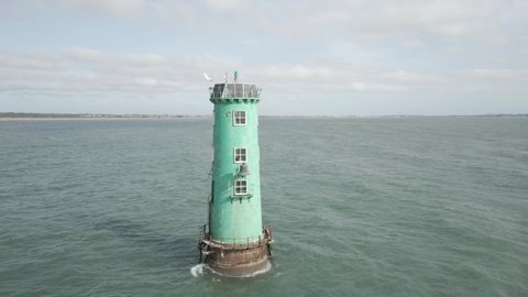 Dublin / Ireland - 09 10 2020: lighthouse middle of nowhere Irish sea Dublin port