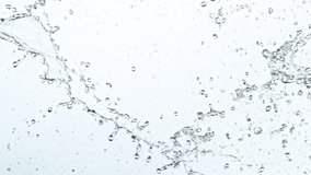 Water Splashing on White Background, Super Slow Motion. Filmed on High Speed Cinema Camera at 1000 fps.