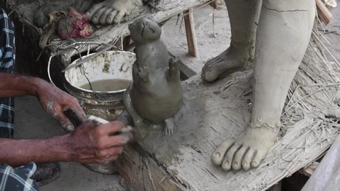 The potters of Kolkata are preparing idols of Goddess Devi Durga and paint those for Durga Puja festival, biggest religious festival of Hinduism.