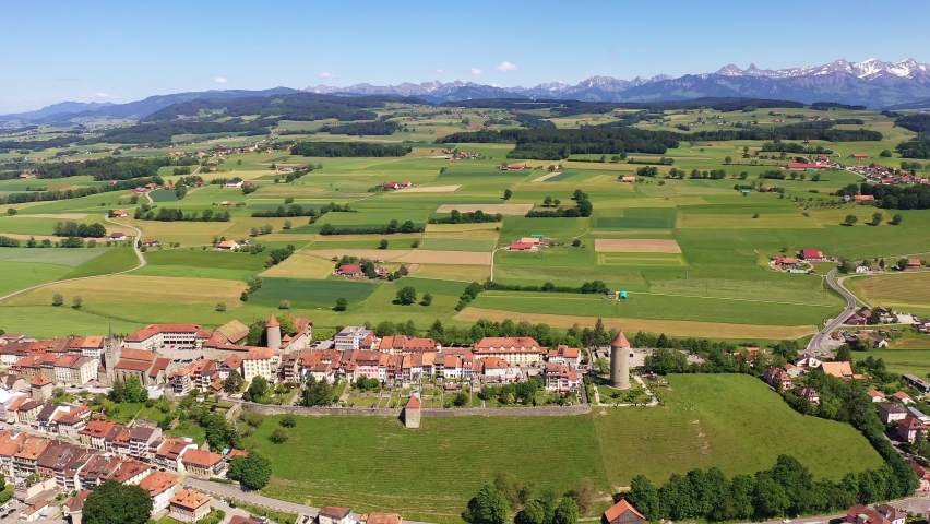 Aerial footage of the Romont medieval old town in Canton Fribourg in Switzerland on a sunny day