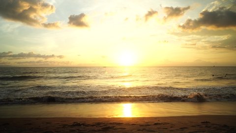 Beautiful view sunset over sea, ocean waves crashing on beach
