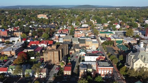 Beautiful aerial views of Winchester, VA walking mall and old town with Appalachian and Shenandoah mountains in the distance.