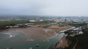 Aerial 4K footage Bude Cornwall beach and canal overcast day
dog walkers on beach high angle