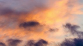 Dreamy colorful abstract cloudscape, dawn time lapse background, telephoto shot