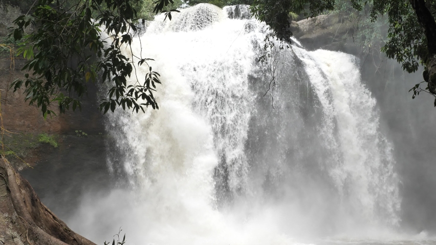 Beautiful waterfall in the rainy season, the landscape of the waterfall,Haew Suwat Waterfall,  Royalty-Free Stock Footage #1060321859