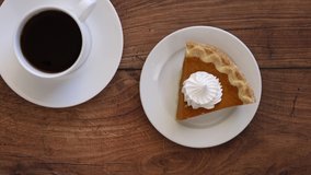 Eating a Slice of Pumpkin Pie with Coffee