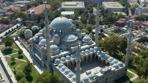 Slowly Circling around Suleymaniye Mosque in Istanbul with green surroundings, Epic Aerial Slide left