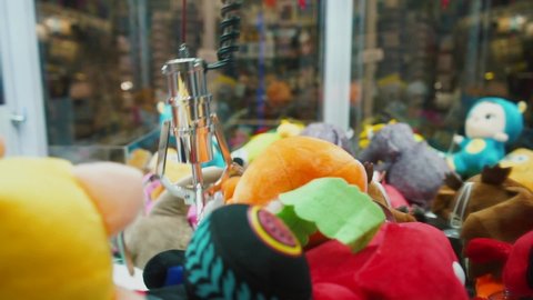 Claw machines are the favorite arcade game for many kids. They are filled with stuffed toys. The machine changes the strength of grip depending on whether the game is supposed to result in win or not.