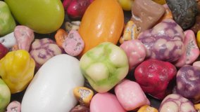 Candy sea pebbles. Glazed colored pebbles.