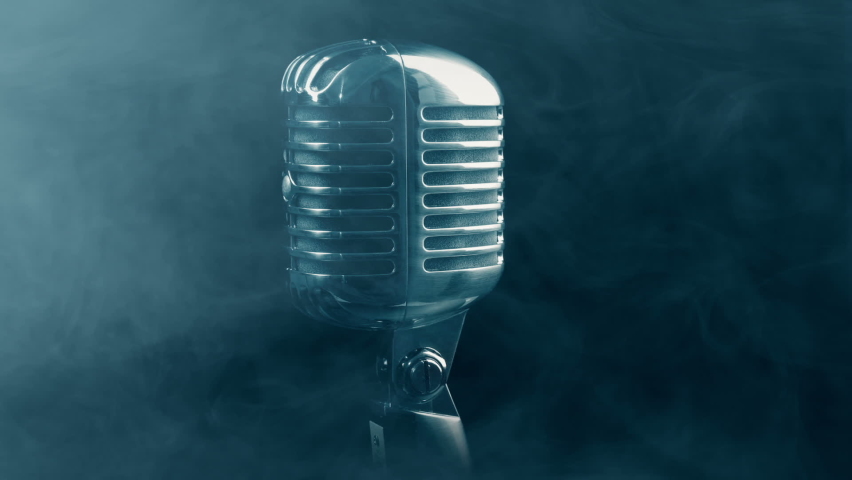 Vintage Microphone Rotating In Smoky Atmosphere Royalty-Free Stock Footage #1060359962