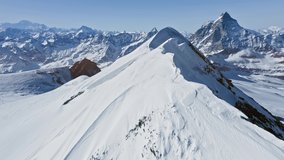 Alps Cold Mountain Top Snow Ice Tourism Sport Eco Travel Mountains Peaks Cliffs Rocks Ridges Landscape Drone Aerial Flight Over Swiss Mountain Range Golden Hour Inspiring Nature 4k Slow Motion - Powered by Shutterstock - Get 15% off with code: PIKWIZARD15