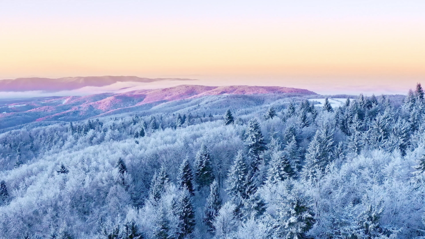 Mountain Frosty Winter Nature Trees Alpine Landscape Early Morning Breathtaking Natural Landscape Sunrise Holiday Travel And Tourism Frosty Tree Tops Vibrant Colors Aerial 4k Royalty-Free Stock Footage #1060362029