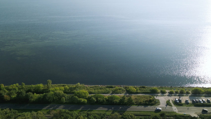 Slow push into infinite Baltica seawater from Kuznica coast Hel Peninsula, Poland, aerial straight forward movement