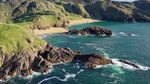 Boyeeghter Bay, commonly known as Murder Hole Beach, is one of the most beautiful beaches in Ireland situated on the Melmore Head Peninsula in County Donegal. Majestic Atlantic waves on sandy beaches